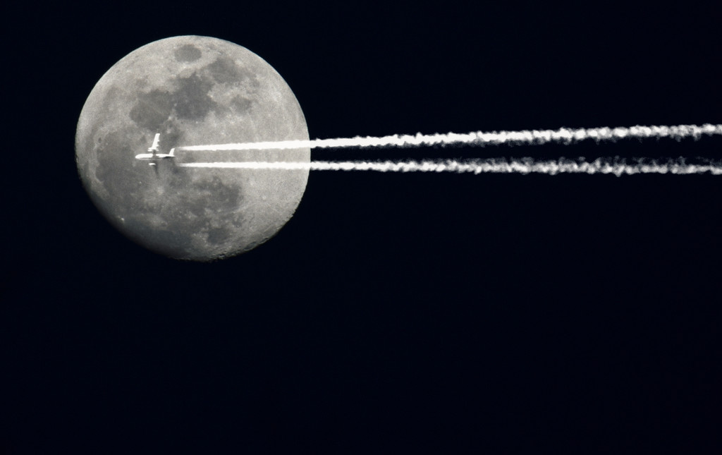 Nearly Full Moon Fly Over by alophoto