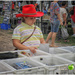 A girl with a red hat @ Nanango country market by kerenmcsweeney
