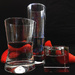 raspberries, glasses and water by marijbar