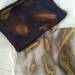 Two ecoprinted silk scarves ready for an exhibition by cpw