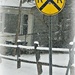 Yellow Before The Crossing Sign by jo38