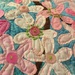 sewing beads on my cherry blossom quilt  by wiesnerbeth
