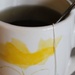 Yellow on my cup of tea by mittens