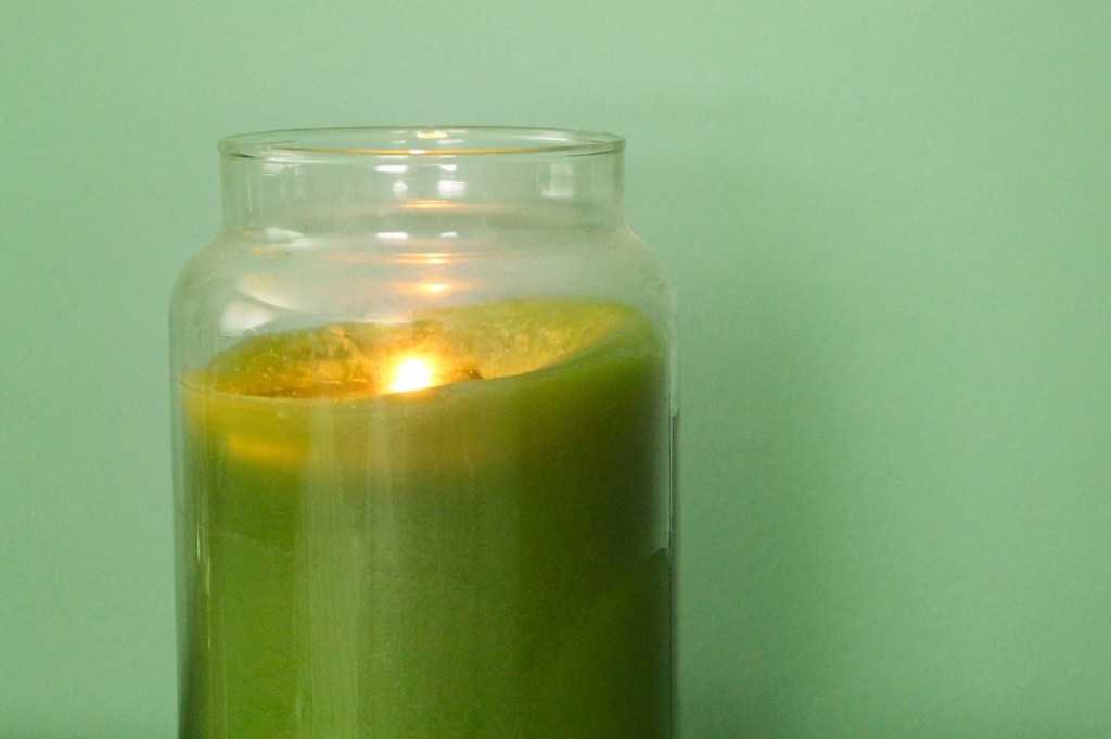 Green candle by mittens