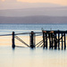 Old pier at first light by frequentframes