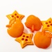 Orange buttons by bizziebeeme