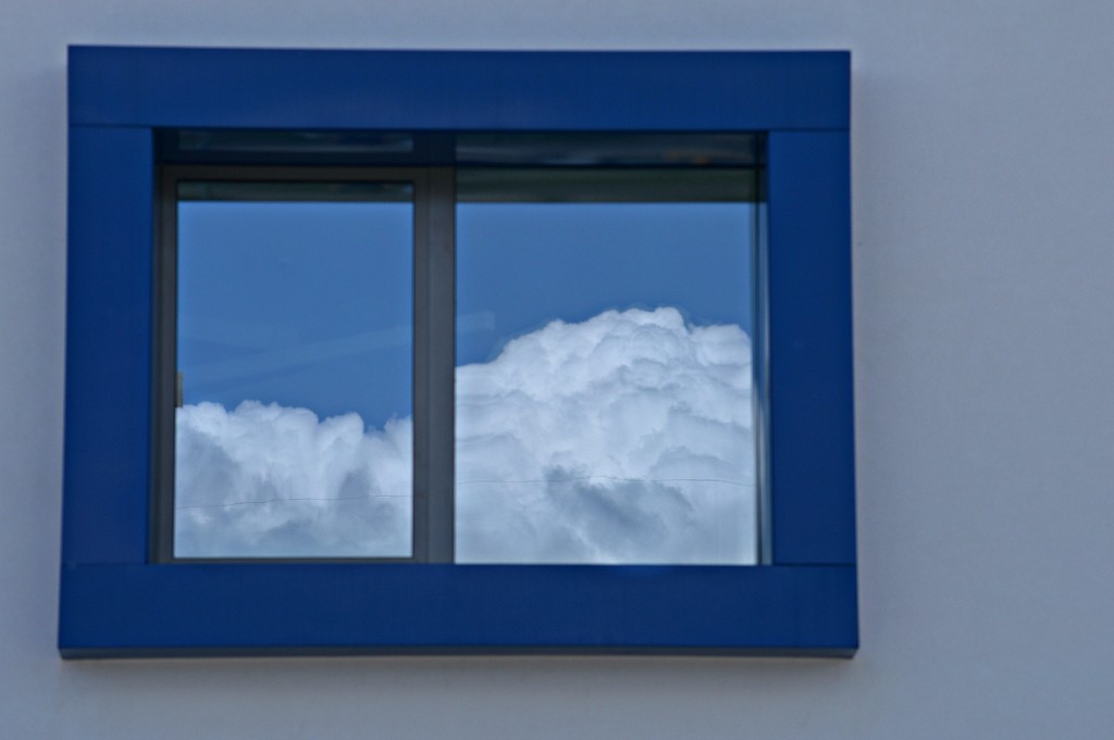 window and clouds by caterina