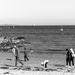 Family on the beach by frequentframes