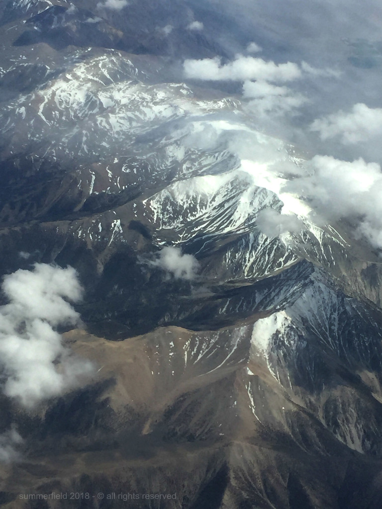 snow-capped desert mountains by summerfield
