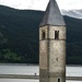 Belltower in the  Resia lake by caterina