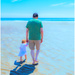 walking with grandpa at the beach by jernst1779