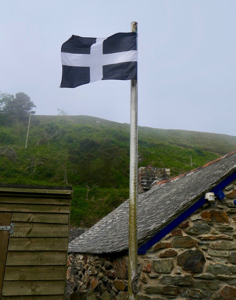 Cornish flag above a former tin mine, Cornwall England by swagman