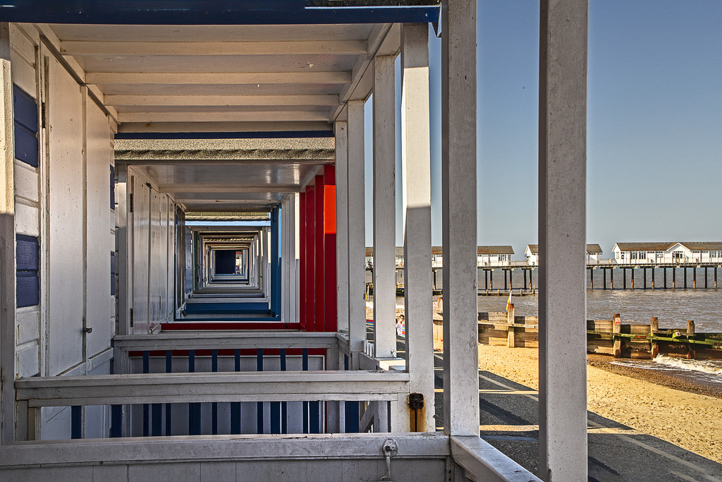 Looking Through the Beach Huts by megpicatilly