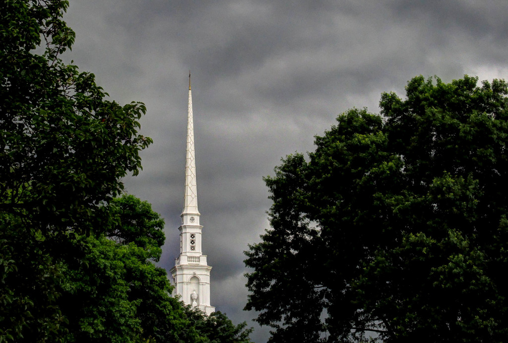 Steeple with rain clouds by mittens