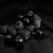 Red fruit in black by cristinaledesma33