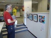 5th Jul 2018 - Laurence looking at my paintings on the Rugby festival of culture art trail