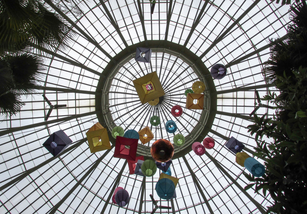 Mobile hanging from dome in Botanical Gardens building by mittens