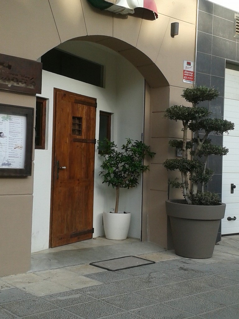 Main door of local hotel.  by chimfa