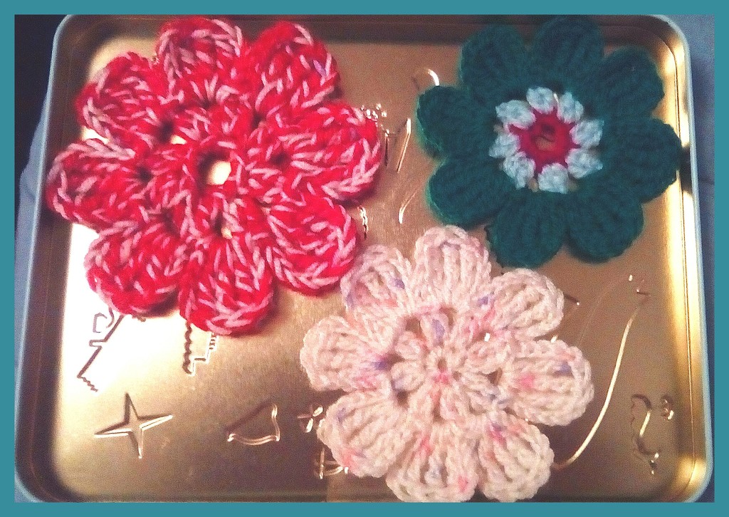 Three crocheted flowers. by grace55