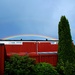 Rainbows over the rooflines by kiwinanna