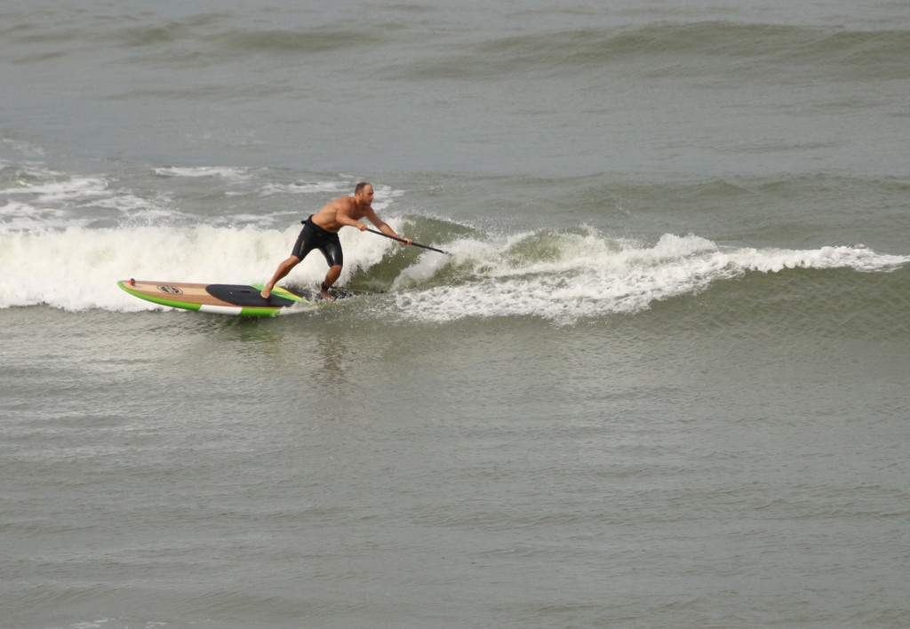 Paddle boarding surf-style by shepherdman