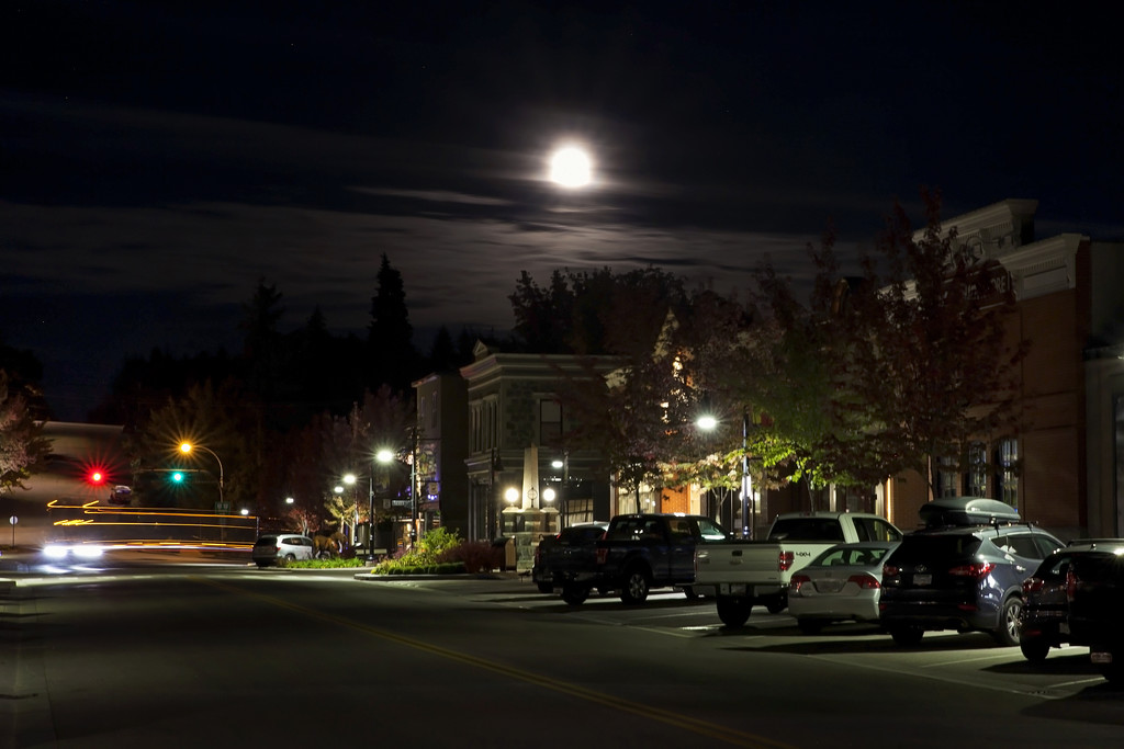Moonrise over town by kiwichick