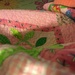 laying In a chair under quilts with a fever by wiesnerbeth