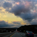 Pretty sky on the highway by mittens