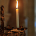 Lit Candle by padlock