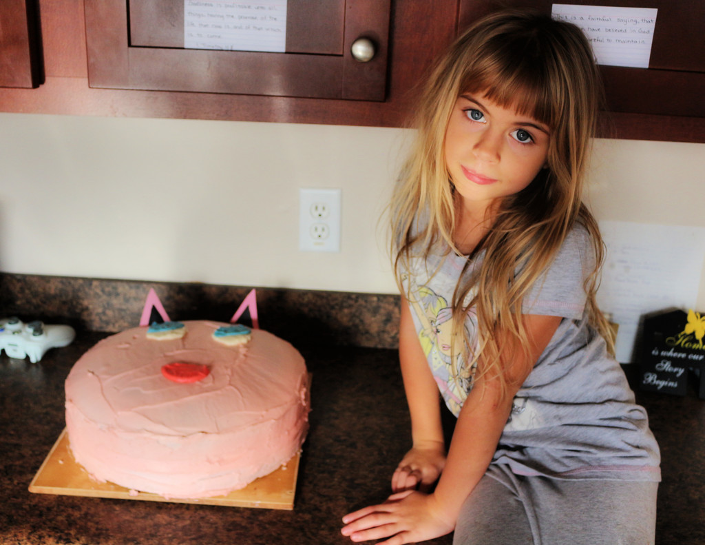Birthday Girl with Massive Cake by juliedduncan
