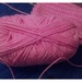 A crocheted pink scarf project. by grace55