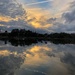 Spectacular clouds and reflections at Colonial Lake.   by congaree