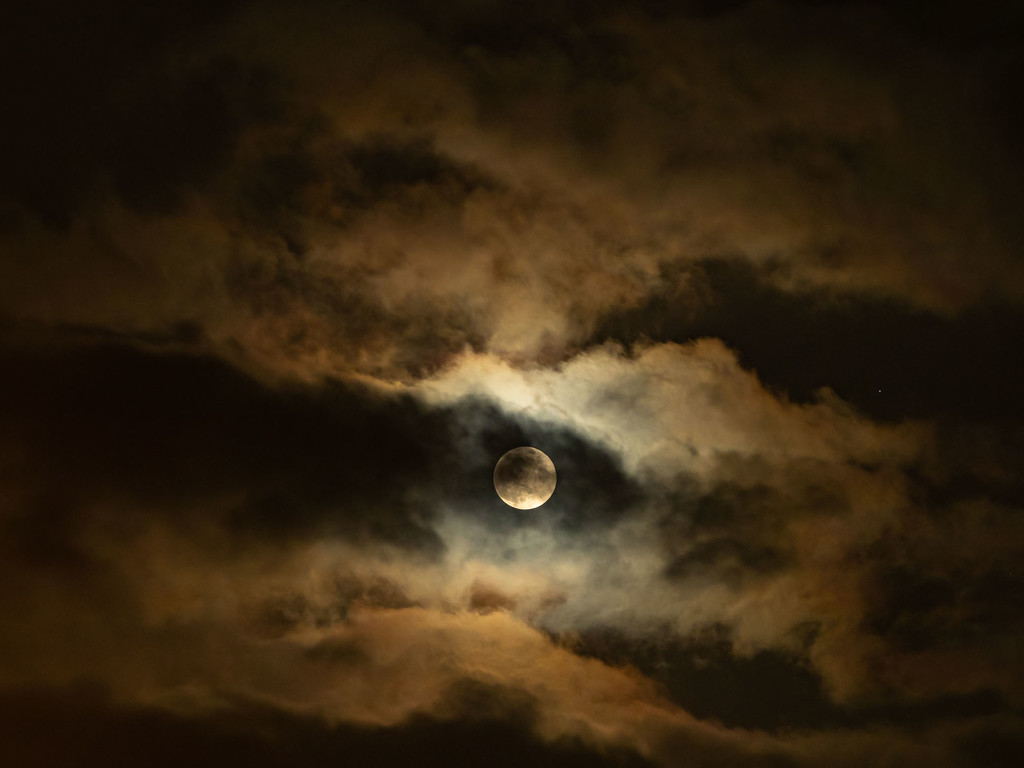  Snowy Moon in the clouds by haskar