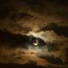  Snowy Moon in the clouds by haskar