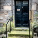 Door In the village of Falkland by frequentframes