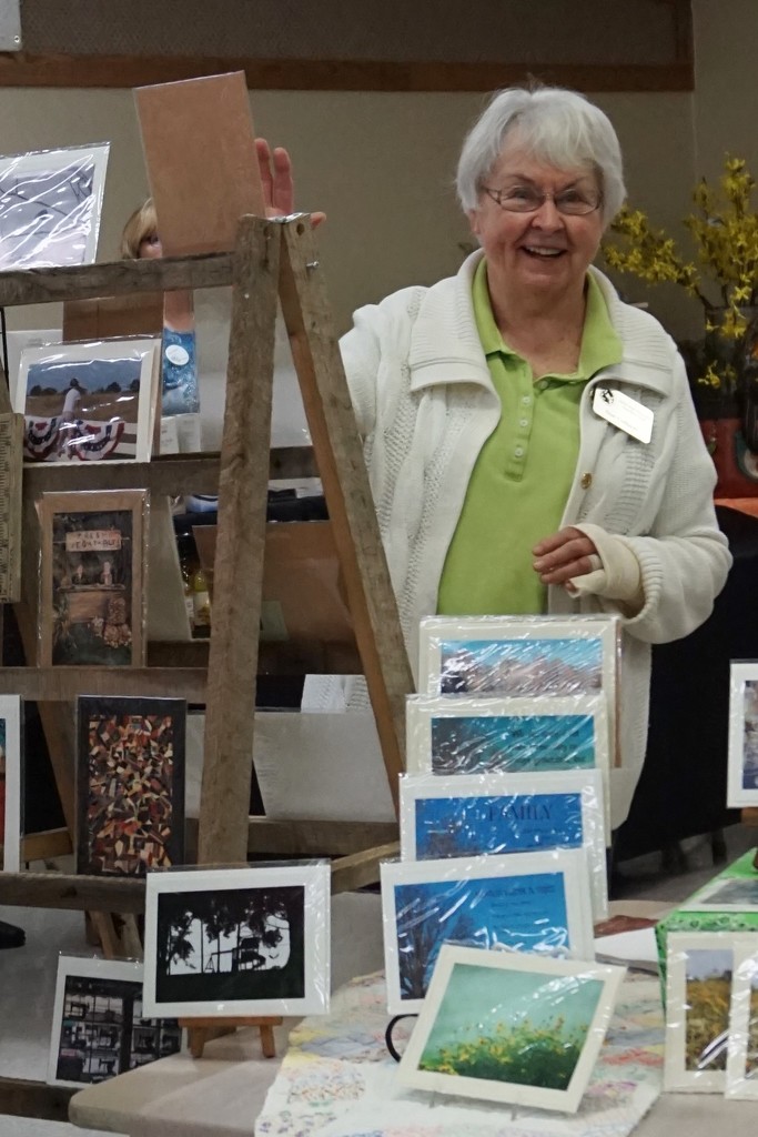 Sue selling her photo cards at the Garden Expo by tunia