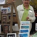 Sue selling her photo cards at the Garden Expo by tunia