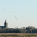 eilandspolder, birds flying around the tower if th church by marijbar