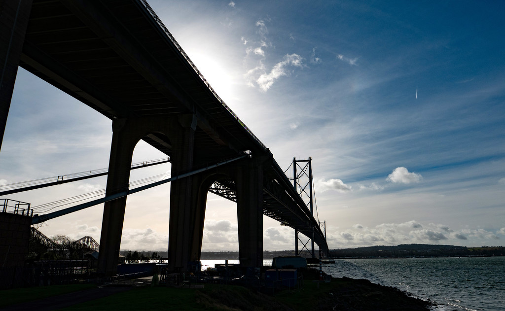 Forth Road Bridge - into the sun by frequentframes
