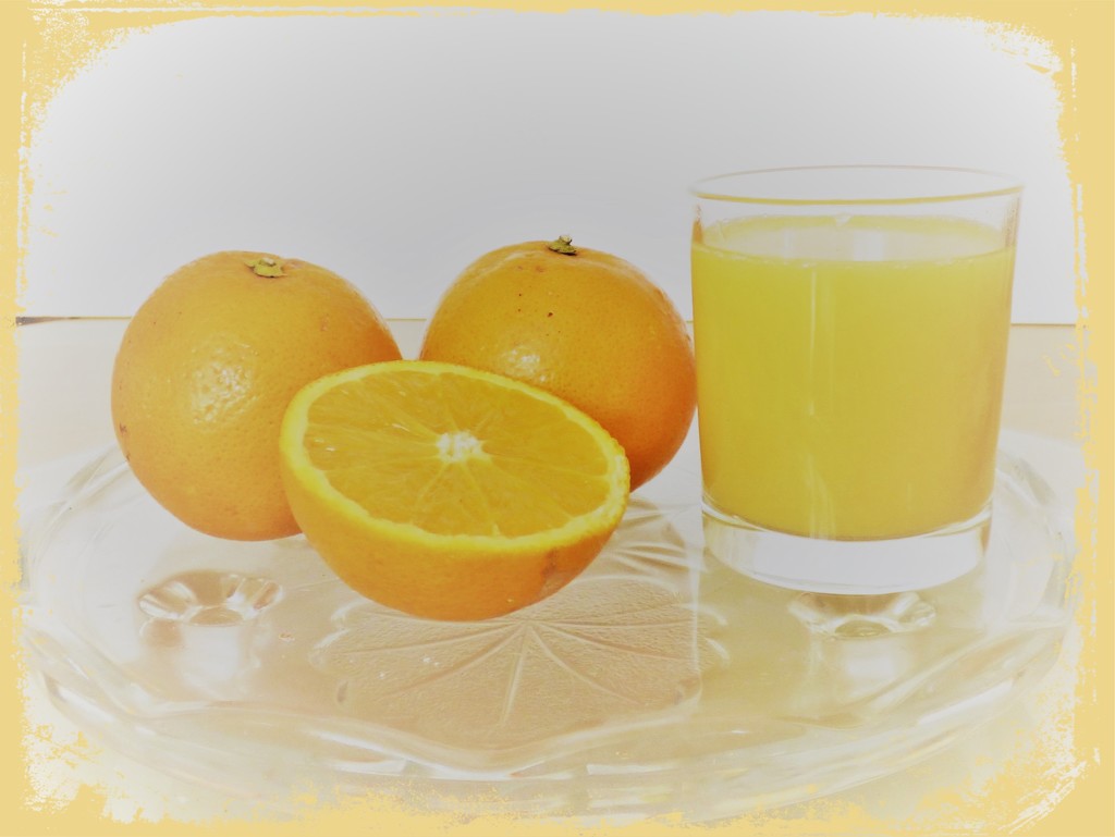 A glass of orange by beryl