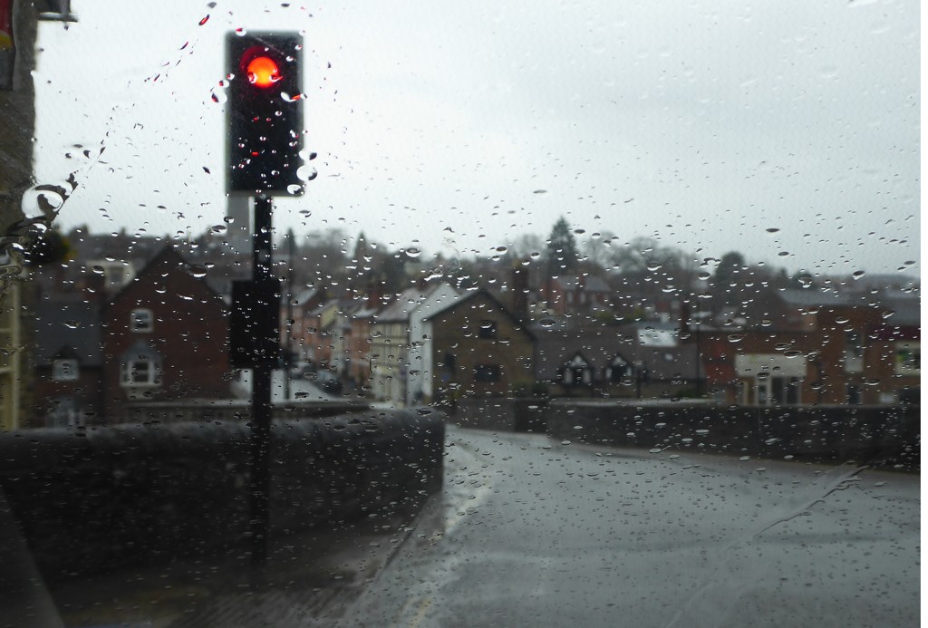 waiting for the lights at Ludlow bridge by snowy