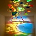 A colored glass mobile that painted a picture  by louannwarren