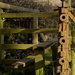 Old ironwork and stile by dailydelight
