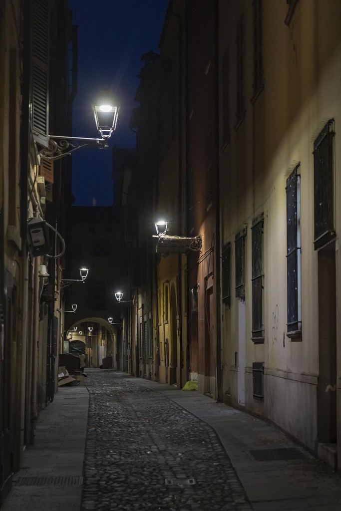 A Modena Side Street at Night by jyokota