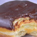 Creme-Filled Donut with Chocolate Icing by sfeldphotos