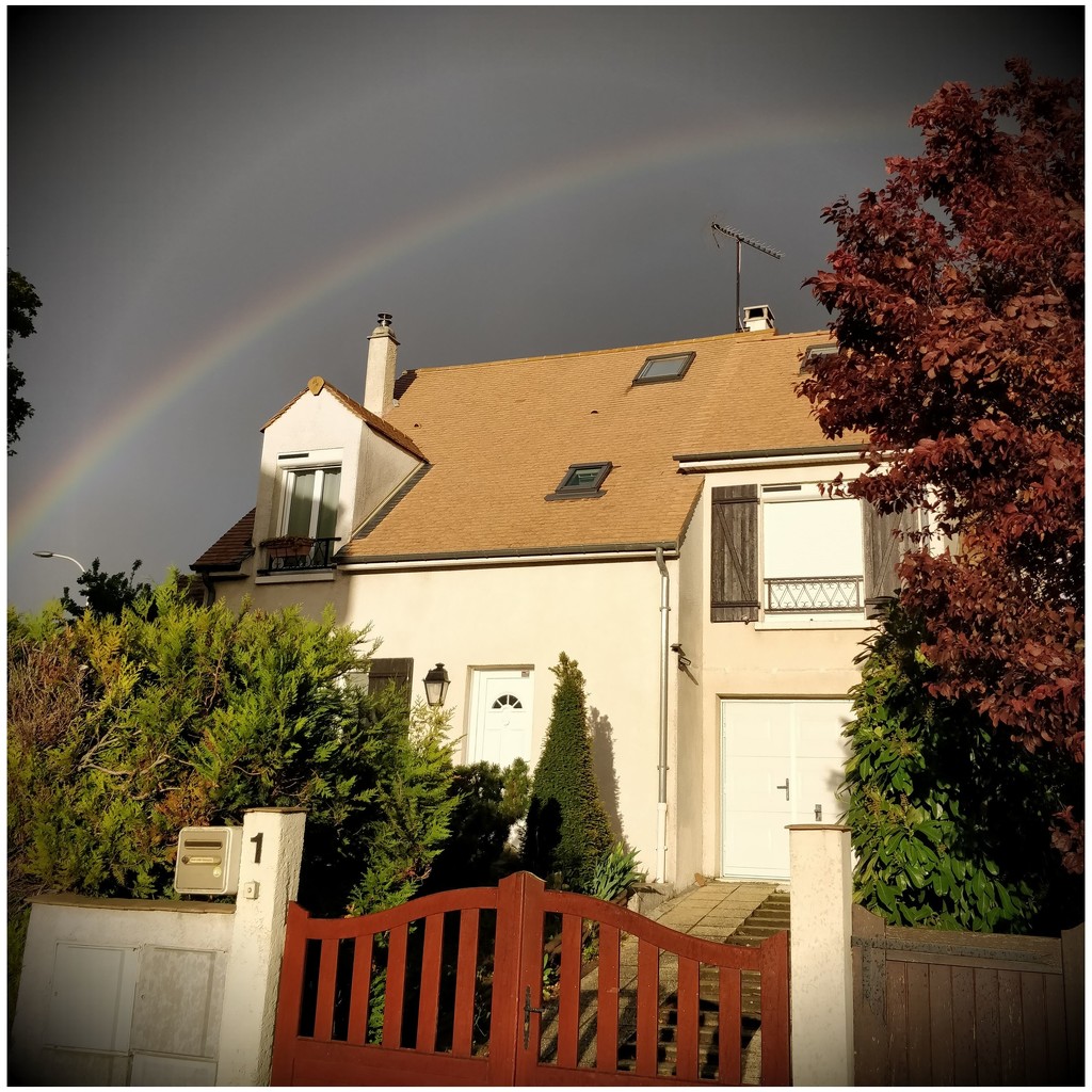 Rainbow over our house by helenejanin