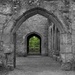 A view through the arches Bodium Castle by bizziebeeme