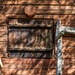 128 - Shadow on timber building by bob65