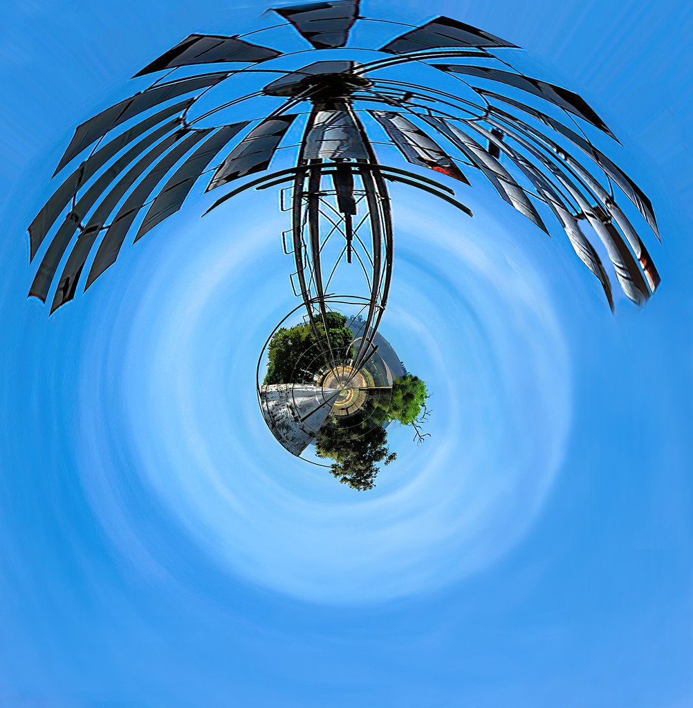 A large windmill in a tiny planet. by ludwigsdiana