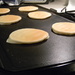 Pancakes on Griddle by sfeldphotos